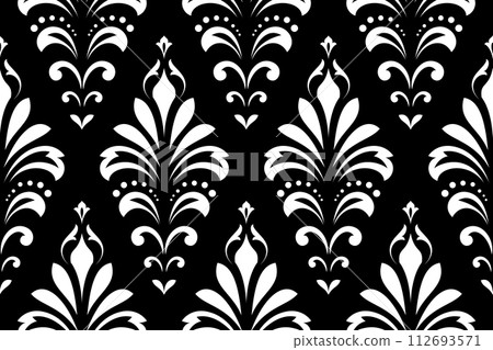 Wallpaper in the style of Baroque. Seamless vector background. White and black floral ornament. Graphic pattern for fabric, wallpaper, packaging. Ornate Damask flower ornament. 112693571
