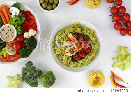 Dietary salads made from fresh vegetables, seafood and white chicken meat. Keto diet. 112695393