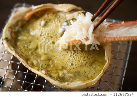 Add loosened crab meat to crab miso 112697554
