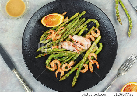 Shrimp with young boiled asparagus. 112697753