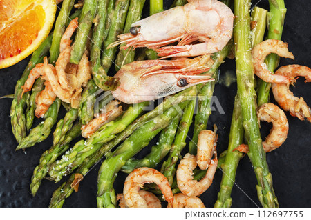 Asparagus with shrimps. 112697755