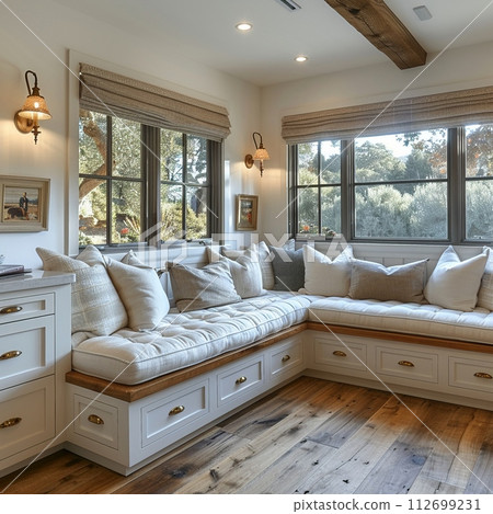 AI-generated content. Cozy breakfast nook with a built-in bench and natural light AI-generated content. Cozy breakfast nook with a built-in bench and natural light 112699231