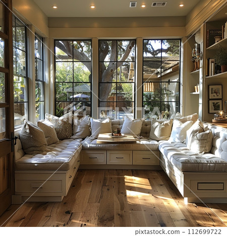 AI-generated content. Cozy breakfast nook with a built-in bench and natural light AI-generated content. Cozy breakfast nook with a built-in bench and natural light 112699722