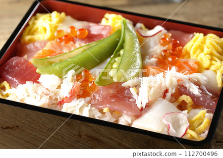 Chirashi sushi with various toppings Chirashi sushi with various toppings 112700496