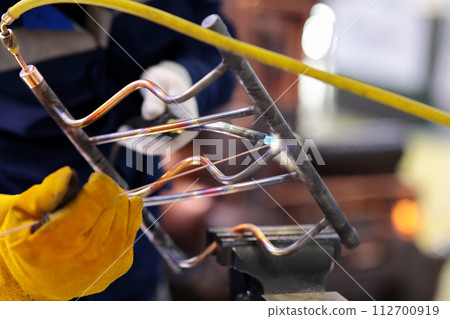 copper pipes gas welding with filler wire 112700919