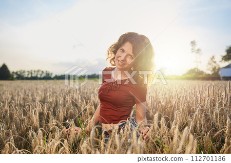 Beautiful woman in the wheat field Beautiful woman in the wheat field 112701186