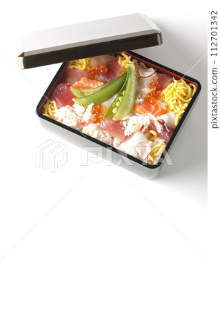 A photo of chirashizushi with various ingredients on a white background A photo of chirashizushi with various ingredients on a white background 112701342