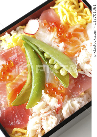 A photo of chirashizushi with various ingredients on a white background A photo of chirashizushi with various ingredients on a white background 112701361