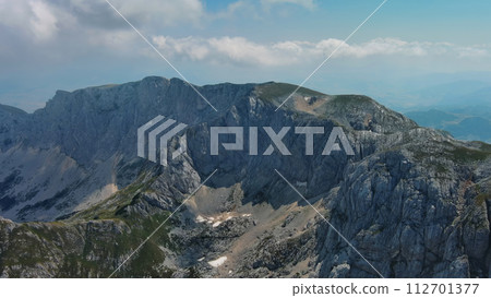 Aerial of mountains in park Durmitor, Montenegro Aerial of mountains in park Durmitor, Montenegro 112701377