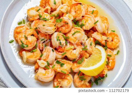 easy spanish garlic shrimp sauteed in olive oil 112702179