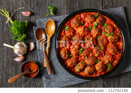 Albondigas, mexican meatballs in dish, top view Albondigas, mexican meatballs in dish, top view 112702180
