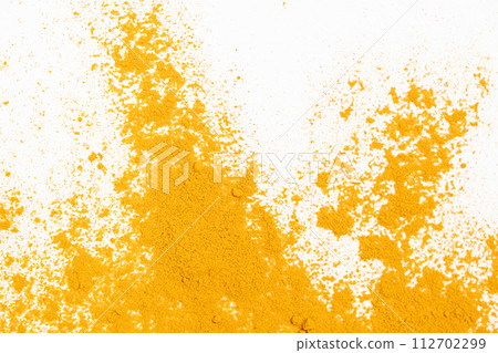 Scattered turmeric powder on white background, turmeric pattern and texture top view 112702299