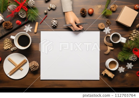Christmas vibe, a mockup image of desk with female hand holding a pencil. Generative AI 112703764