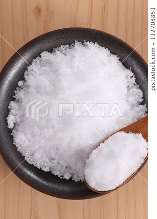 salt on a small plate 112703851