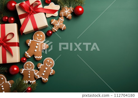 Christmas Banner with some presents, gingerbread man cookies on green background. Generative AI Christmas Banner with some presents, gingerbread man cookies on green background. Generative AI 112704180