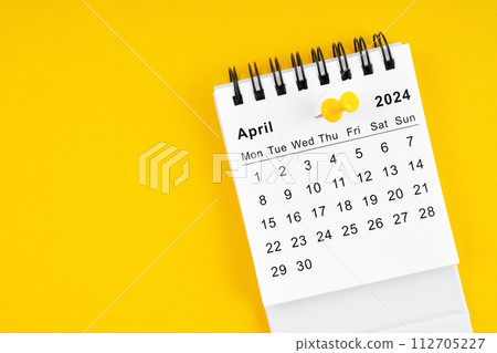 April 2024 Monthly desk calendar for 2024 year with thumbtack. 112705227