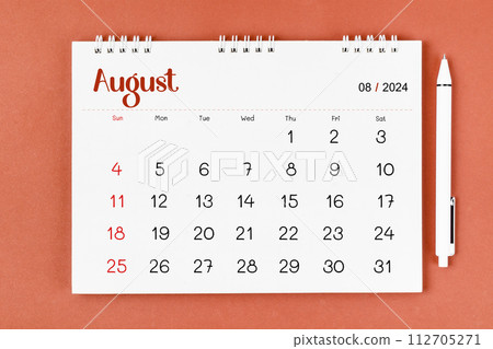 August 2024 Monthly desk calendar for 2024 year and pen. 112705271