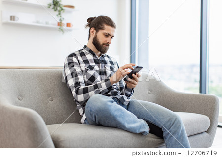 Efficient freelance worker texting message to colleague while performing project 112706719