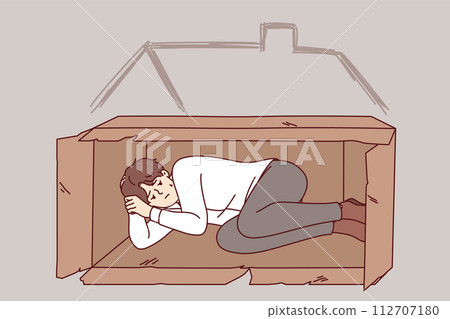 Homeless man sleeps in box on street after being fired from job due to labor market crisis Homeless man sleeps in box on street after being fired from job due to labor market crisis 112707180
