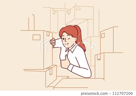 Woman warehouse supervisor shows thumbs up as sign of completion of audit and absence of lost goods 112707200