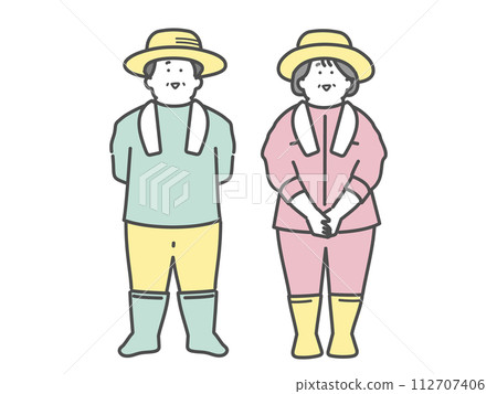 A smiling elderly couple working at a farm A smiling elderly couple working at a farm 112707406