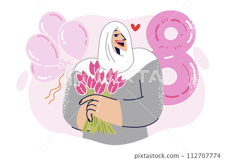 Muslim girl celebrates international women day holding bouquet of flowers in hand 112707774