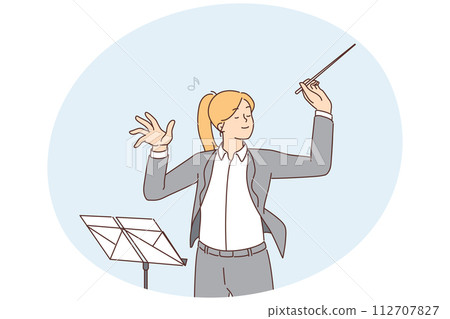 Female conductor leading orchestra 112707827