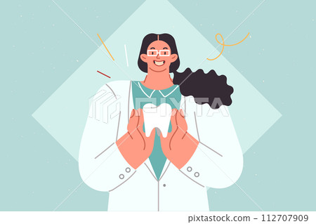 Woman dentist demonstrates large human tooth calling for attention to oral diseases 112707909
