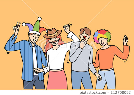 Group of friends participating in masquerade, dancing and enjoying festive party Group of friends participating in masquerade, dancing and enjoying festive party 112708092