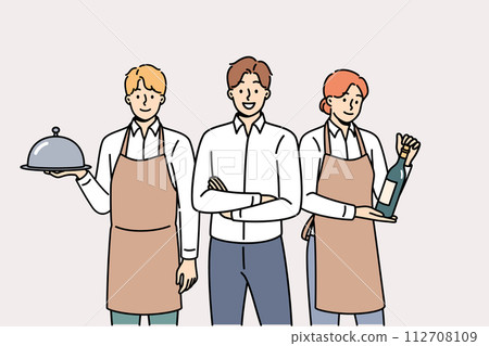 Restaurant waiters and administrators are ready to serve guests who want to have lunch or dinner 112708109