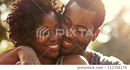 Capture pure joy and affection with this charming image of a couple in a loving embrace 112708178