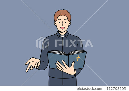 Man priest reads bible and gestures calling on people to accept christian or catholic religion Man priest reads bible and gestures calling on people to accept christian or catholic religion 112708205