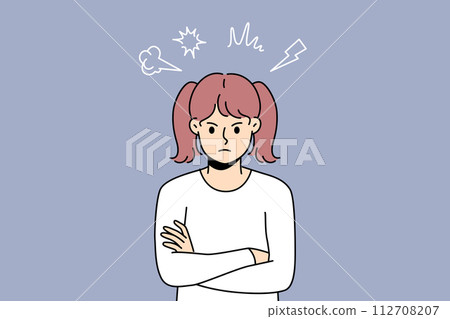 Angry little girl stands with arms crossed and looks at screen with hatred, showing disobedience Angry little girl stands with arms crossed and looks at screen with hatred, showing disobedience 112708207