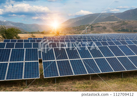 Solar power station. Solar panels, photovoltaics, alternative source of electricity - concept of sustainable and renewable sources. 112709412