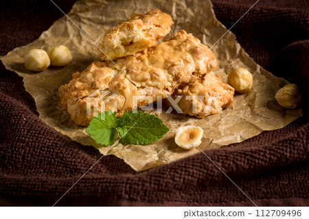 Cookies with hazelnuts. Crispy cookies of a rectangular shape with nuts 112709496