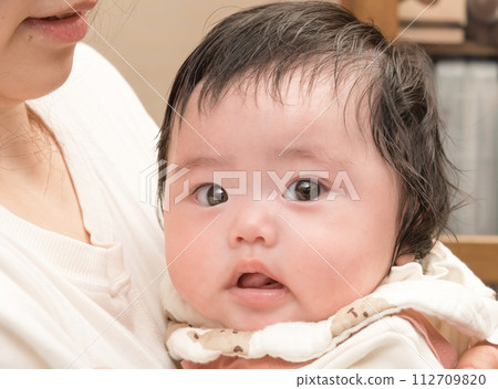 [Holding a baby] 112709820