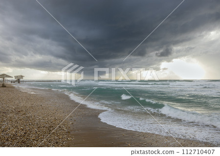 Dramatic sea view with storm clouds in Haifa 112710407