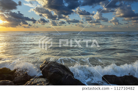 seashore with dramatic clouds at sunset in Haifa seashore with dramatic clouds at sunset in Haifa 112710482