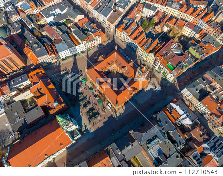 Aerial panoramic view of historical buildings and roofs in Polish medieval town Torun 112710543