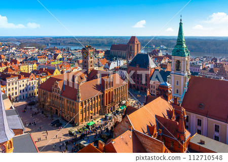 Aerial panoramic view of historical buildings and roofs in Polish medieval town Torun Aerial panoramic view of historical buildings and roofs in Polish medieval town Torun 112710548