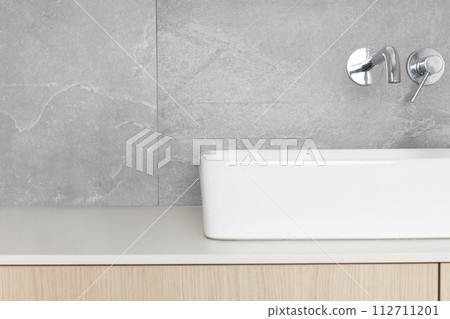 Sleek Modern Bathroom Sink with Wall-Mounted Faucet Sleek Modern Bathroom Sink with Wall-Mounted Faucet 112711201