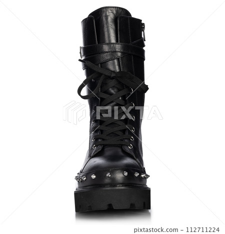 A black boot with a black lace and a black buckle A black boot with a black lace and a black buckle 112711224