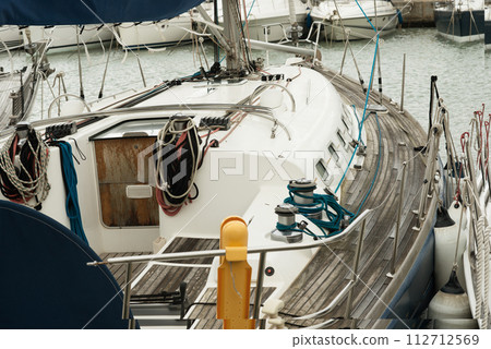 Detailed Deck View of Sailing Yacht in Marina 112712569