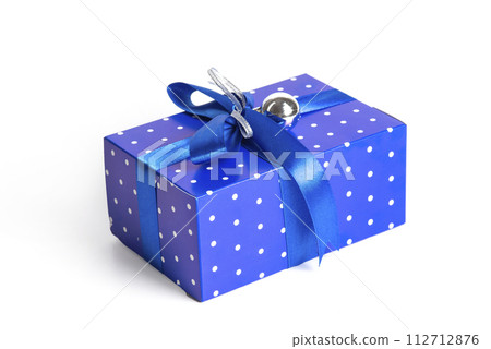 Blue Gift Box With blue Ribbon and toy on white Background. Christmas present box 112712876