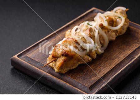 Delicious fresh chicken meat kebab with salt, spices and herbs 112713143