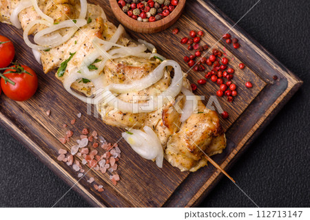 Delicious fresh chicken meat kebab with salt, spices and herbs Delicious fresh chicken meat kebab with salt, spices and herbs 112713147