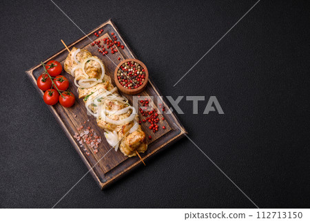 Delicious fresh chicken meat kebab with salt, spices and herbs 112713150