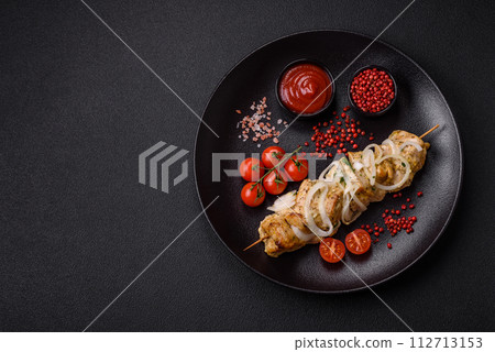 Delicious fresh chicken meat kebab with salt, spices and herbs 112713153