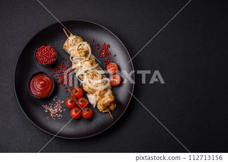 Delicious fresh chicken meat kebab with salt, spices and herbs 112713156