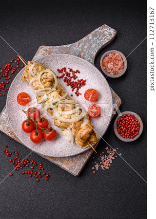 Delicious fresh chicken meat kebab with salt, spices and herbs 112713167